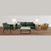 Interior view showing the coffee table styled with decorative accents in a minimalist room with soft neutral tones