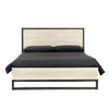 Straight-on studio shot of the bed styled with minimalist black bedding to highlight the warm wood grain