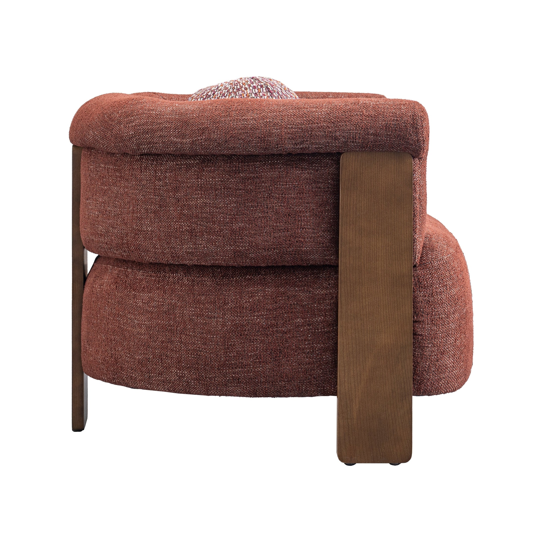 Front view of the Stave accent chair in rust-toned bouclé fabric with a dark walnut wood frame and a spherical lumbar pillow