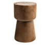 Front view of a sculptural paulownia wood stool in medium brown featuring a rounded top and a tapered pedestal base