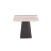 Side profile view showcasing the sleek low-profile travertine slab and the sturdy geometric silhouette of the pedestal support