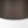 Macro detail shot focusing on the smooth dark brown wood grain and the elegant curve of the tapered drum base