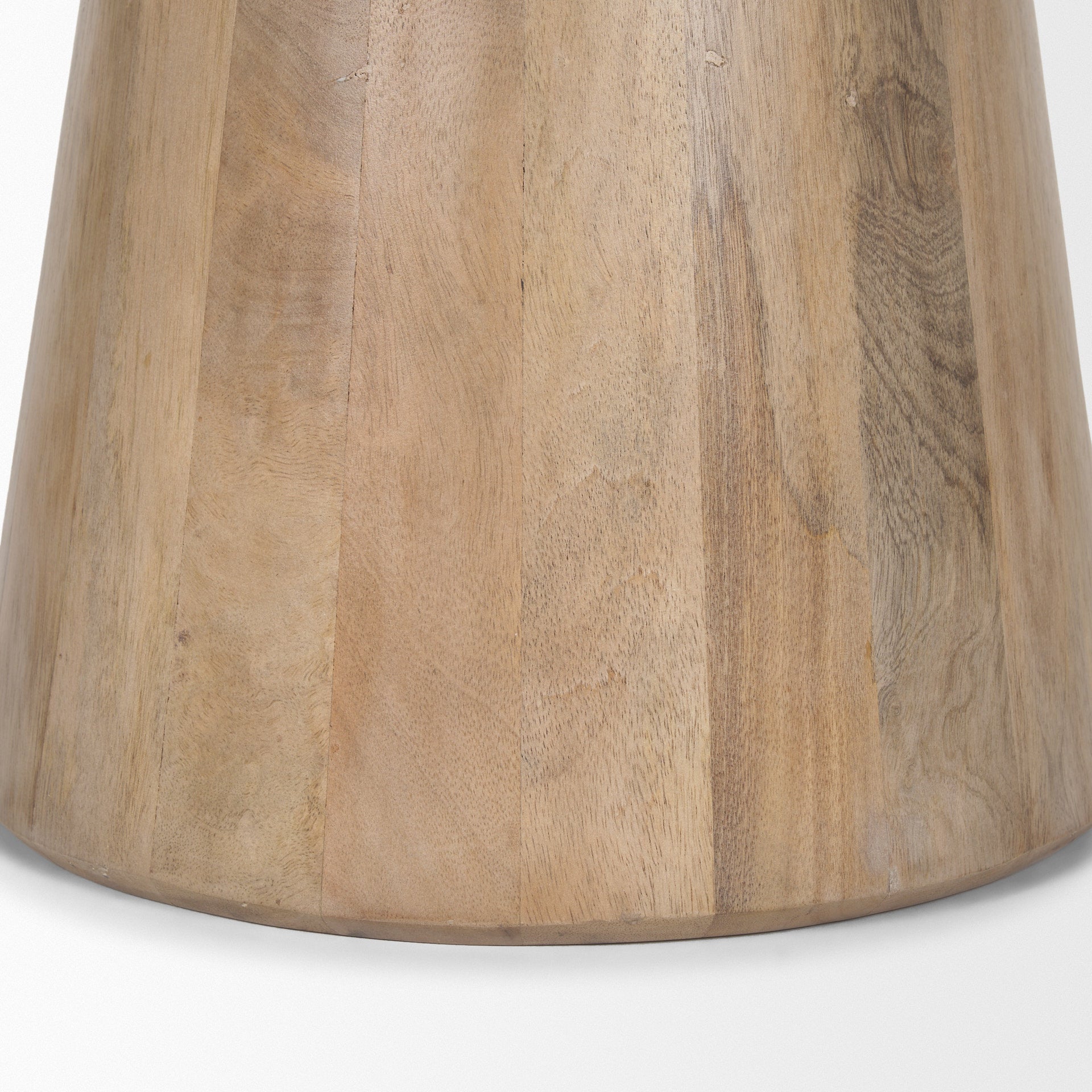 Front view of the Takoda accent table in light brown wood featuring a tapered drum pedestal base and a circular tray-style top