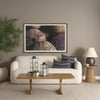 Lifestyle view of the Takoda table styled in a neutral contemporary living room as an accent piece next to a sofa