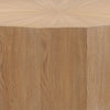 Close-up shot highlighting the vertical wood grain and the sharp geometric facets of the Tamsin table base