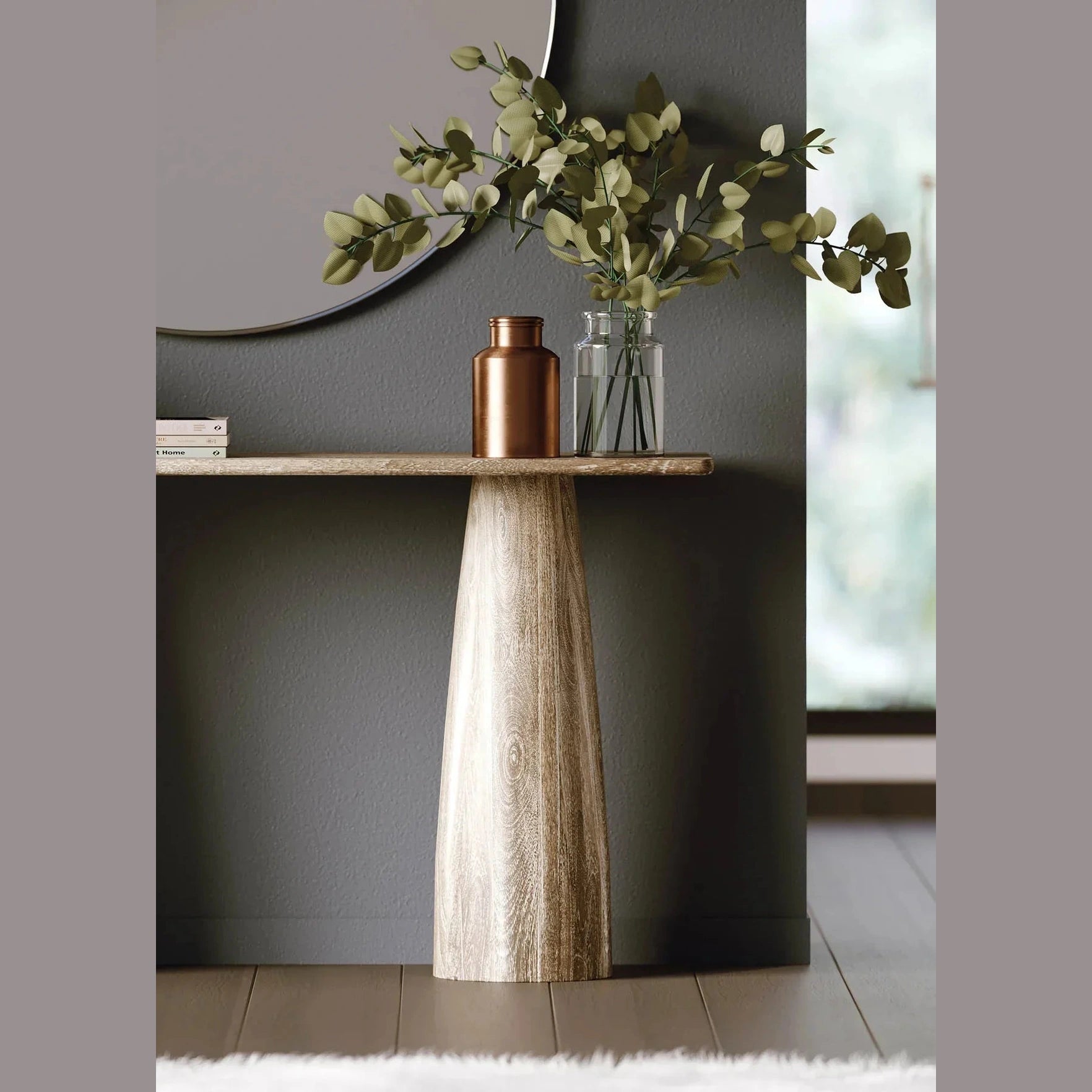 Front view of the Truffle console table in natural light mango wood featuring two large architectural pillar-style legs