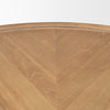Macro view of the tabletop surface showcasing the rich natural oak grain and warm brown finish