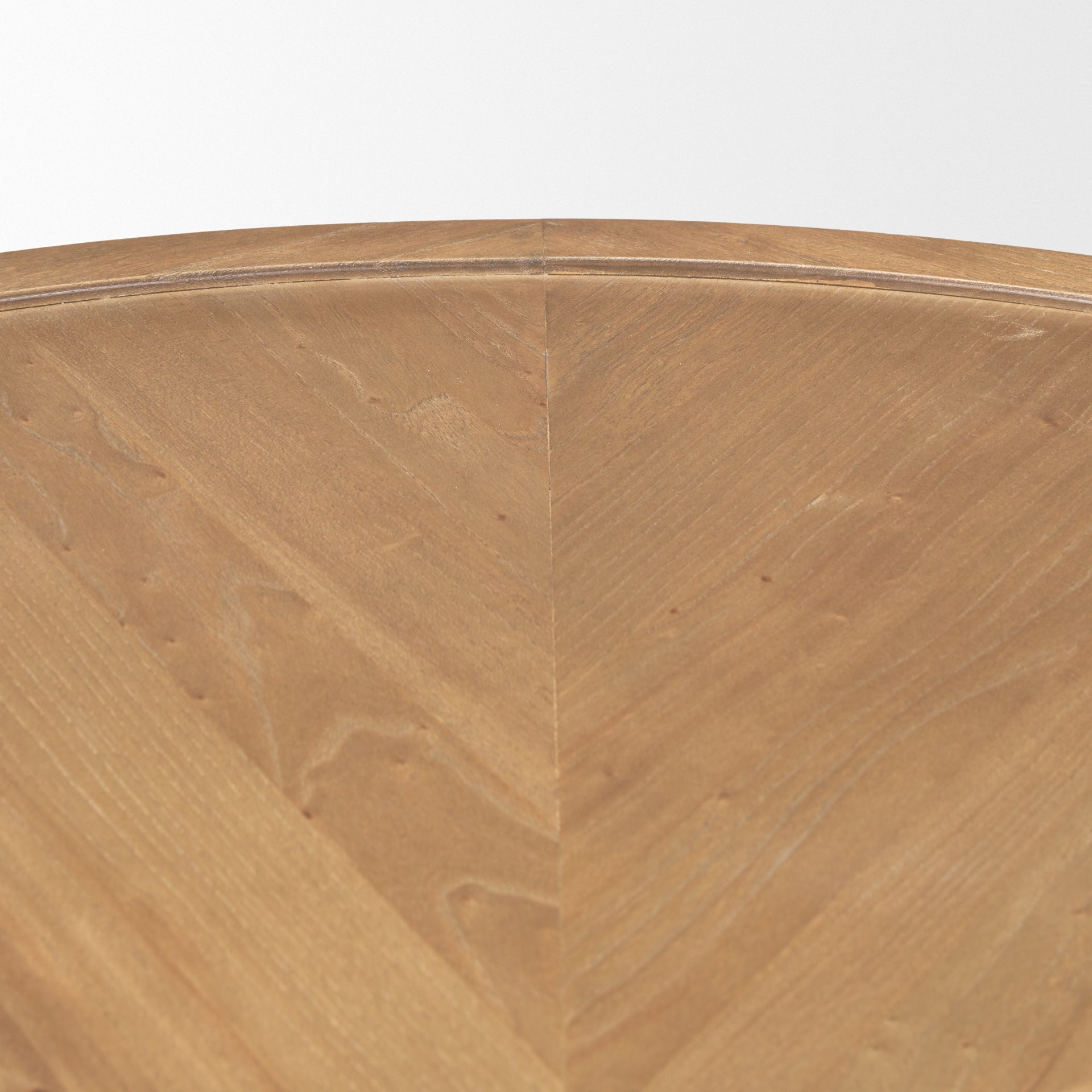 Front view of the Tavi round coffee table in a medium brown oak finish featuring a chunky double-cylinder pedestal base