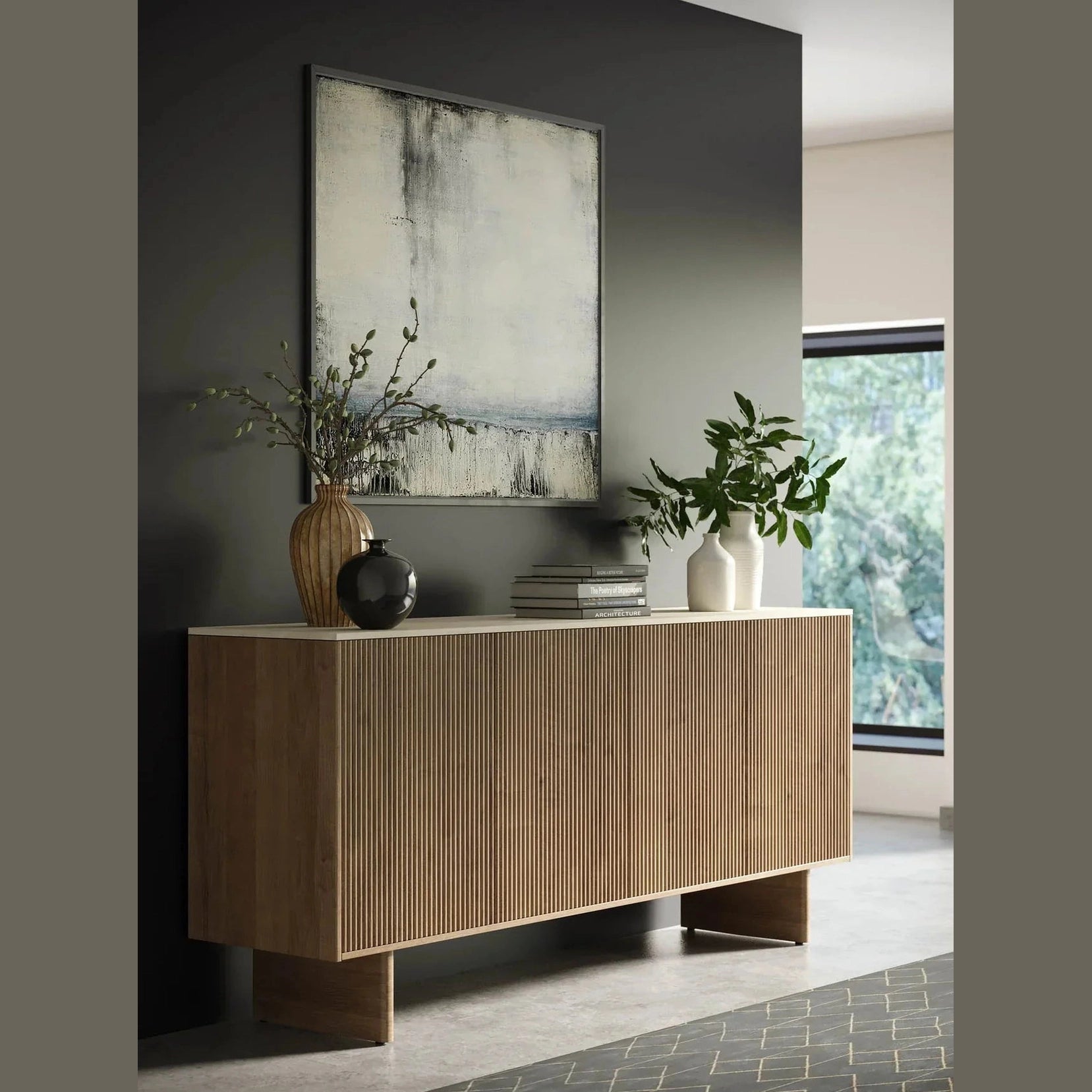 Front perspective view of the Hedron sideboard featuring vertical fluted oak wood panels and a white marble top surface