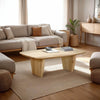 Lifestyle shot featuring the Tonic biscotti oak coffee table styled in a contemporary living room with a brown modular sectional sofa