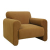 Side profile of the ginger Torvi chair showcasing the deep-set frame and rounded back