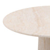 Lifestyle shot featuring the Trebol nesting tables styled in a bright outdoor patio setting with a white sectional sofa