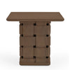 Front view of the Trellyn accent table featuring a smooth square tabletop and a unique architectural base with a hand-carved woven texture in a warm wood finish