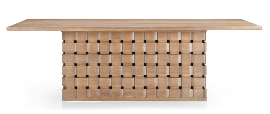 Front view of the 94 inch Trellyn solid wood dining table featuring a thin rectangular top and a decorative carved woven pedestal base