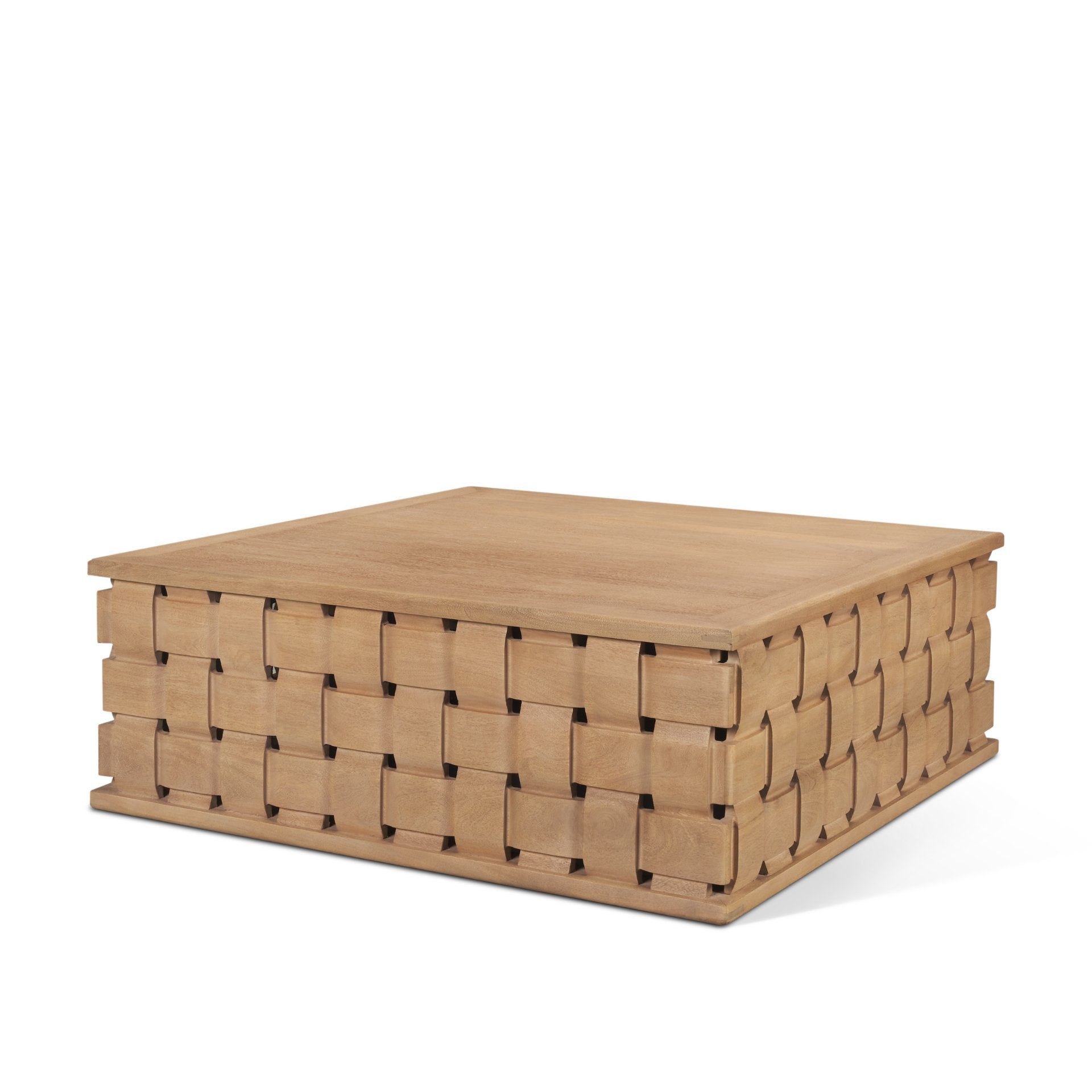 Side profile view emphasizing the low-profile plinth design and the consistent carved pattern across the base