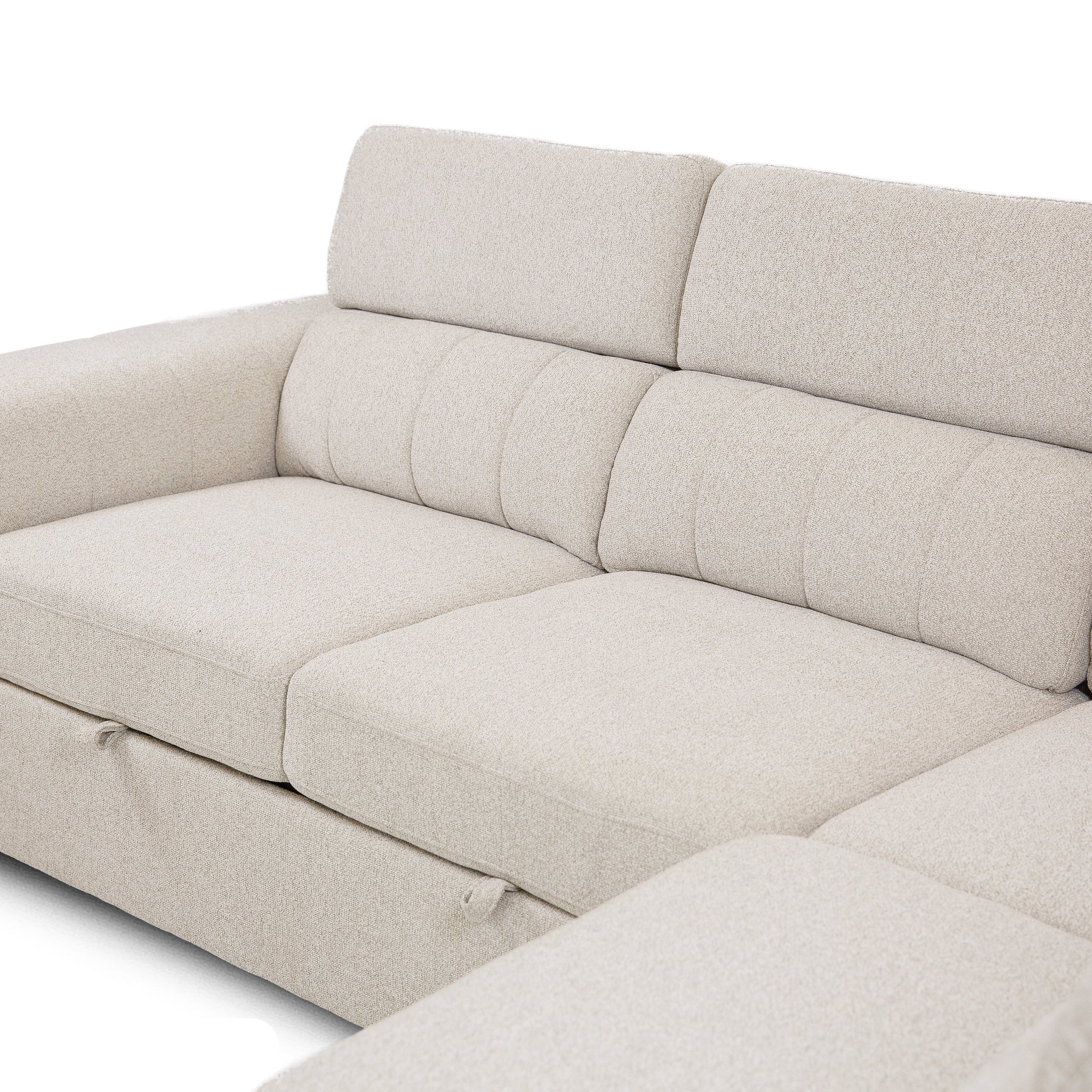 Front view of the Tristan Sleeper Sectional in Fritillary cream fabric with adjustable headrests and storage ottoman
