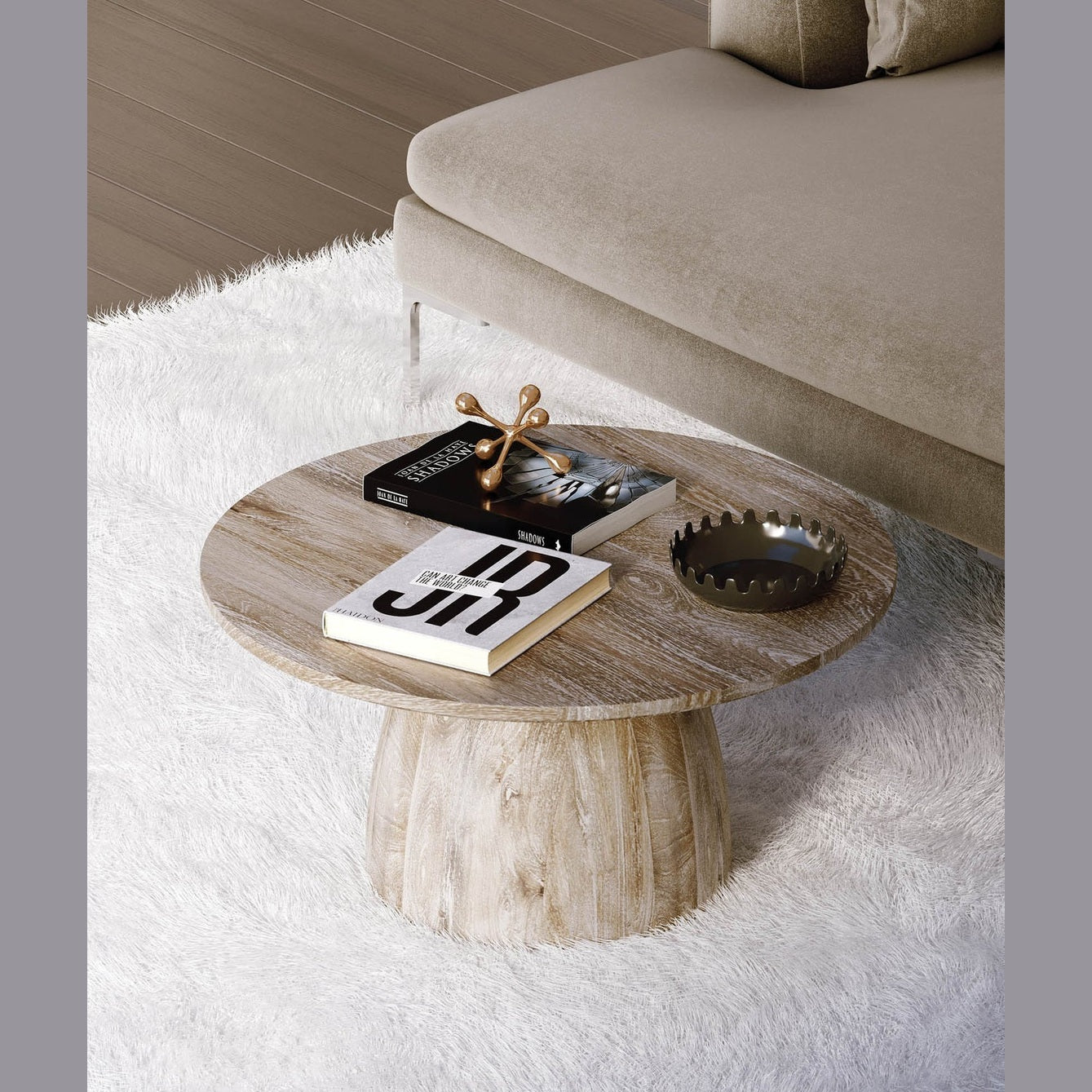 Front view of the Truffle coffee table featuring a circular top and a thick dome-shaped pedestal base in a light natural oak finish