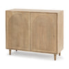 Tucker accent cabinet in light natural wood with carved arch door patterns
