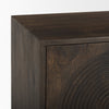 Detail of the top corner construction on the dark wood Tucker cabinet