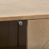 Detail shot of the magnetic door catch hardware on the Tucker wood cabinet