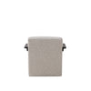 Back view of Tyra upholstered accent chair with soft textured fabric