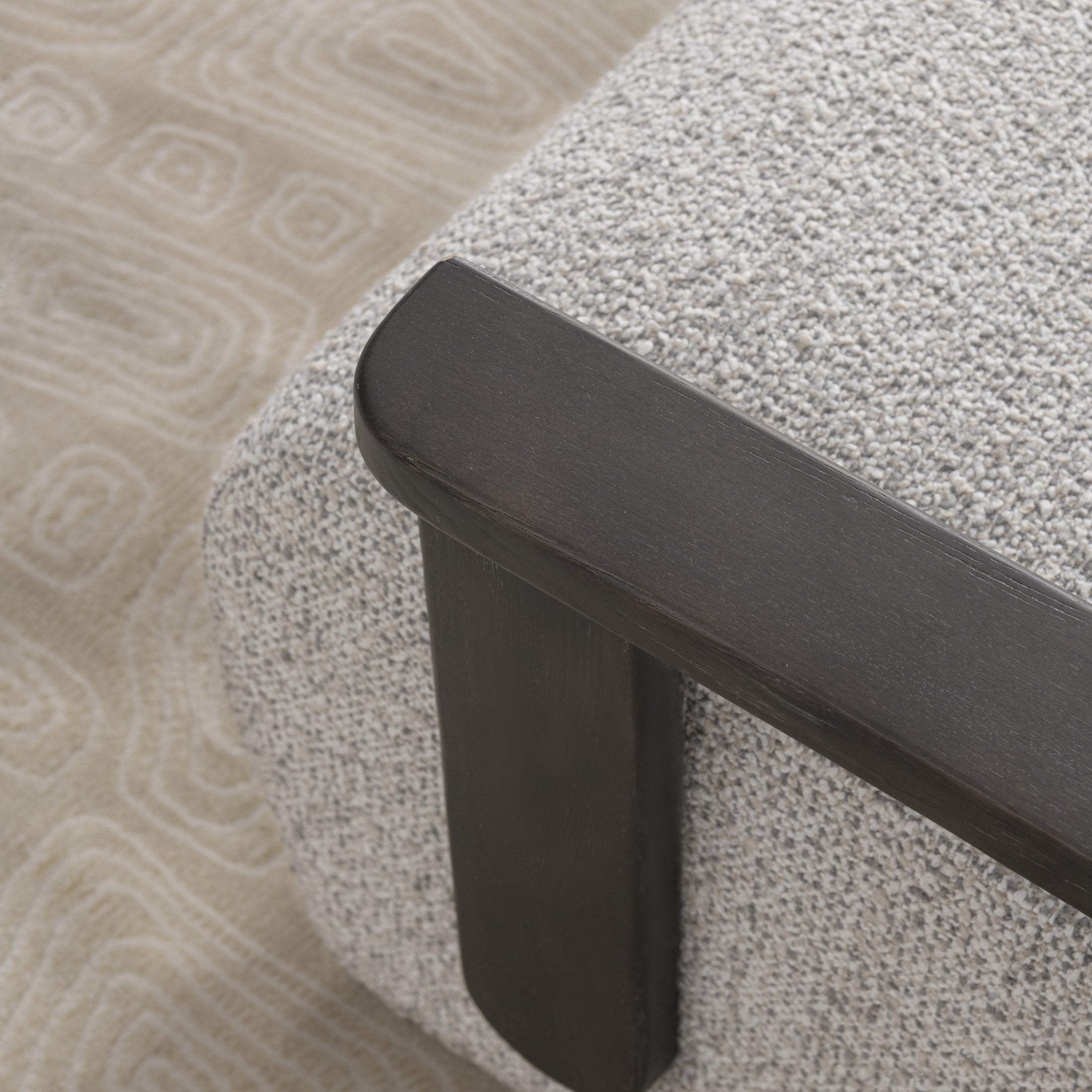 Tyra accent chair in cream fabric with dark wood armrests by Hygge Design House Vancouver