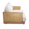 Side profile showcasing the clean lines of the oak frame and the uniform texture of the ivory upholstery.