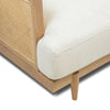 Rear view of the Unio chair highlighting the sturdy oak construction and the clean backrest profile.