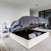 Detail shot of the upper corner of the headboard showcasing the soft cushioning and clean seam construction