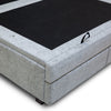 Close-up shot of the bed base featuring a convenient fabric pull tab for easy storage access