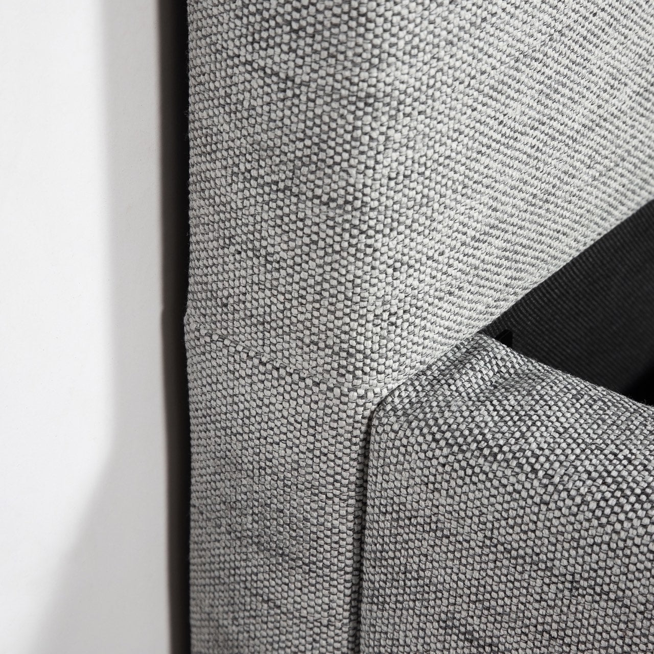 Front view of the Julia storage bed featuring a soft sand fabric and a modern horizontal channel tufted headboard