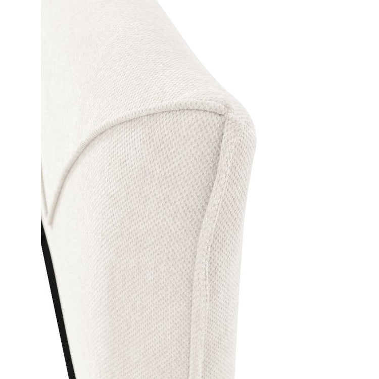 Front view of the Aici storage bed featuring a cream fabric finish and a unique V-shaped geometric stitched headboard