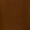Full-frame macro shot of the vegan nut leather upholstery for material reference