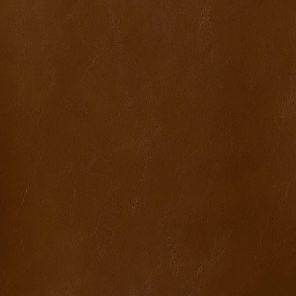 Full-frame macro shot of the vegan nut leather upholstery for material reference