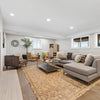 Alternative angled shot showing the substantial silhouette and natural beige tones of the stone and wood materials
