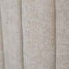 Macro shot focusing on the high-quality woven fabric and the clean vertical channel tufting lines
