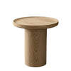 Perspective shot highlighting the clean architectural silhouette and the raised lip detail of the natural wood tabletop
