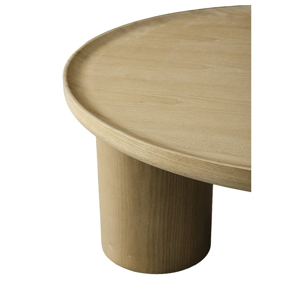 Front view of the Viggo round coffee table featuring a natural wood finish and three chunky cylindrical pedestal legs