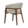 Straight-on side profile view focusing on the ergonomic curve of the backrest and the stability of the metal frame