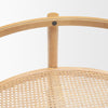 Close-up shot focusing on the smooth light brown wood frame and the seamless circular joinery of the table