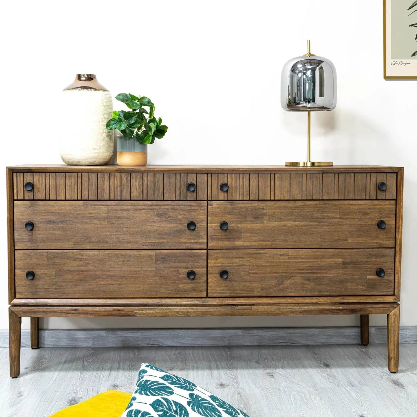 Front view of the West 6-drawer double dresser featuring a rich natural wood finish, dark circular knobs, and top drawers with vertical fluted detailing