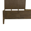 Close-up view of the tapered solid wood leg highlighting the mid-century modern design influence