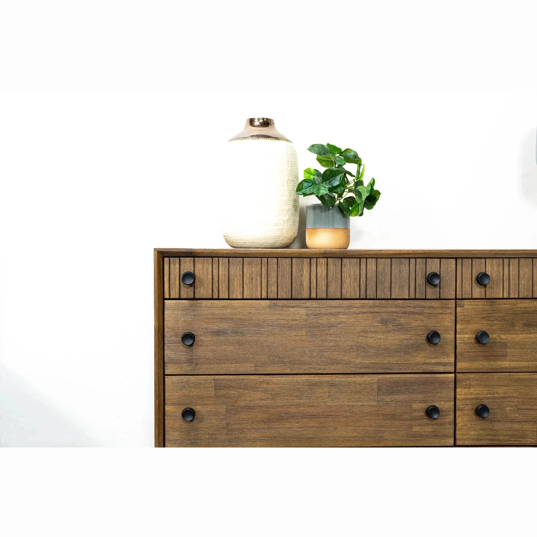 Front view of the West 6-drawer double dresser featuring a rich natural wood finish, dark circular knobs, and top drawers with vertical fluted detailing