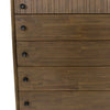 Close-up perspective focusing on the decorative vertical ribbing of the top drawer and the uniform wood grain of the lower drawers