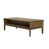 Three-quarter perspective highlighting the open lower shelf and slim tapered legs of the West coffee table