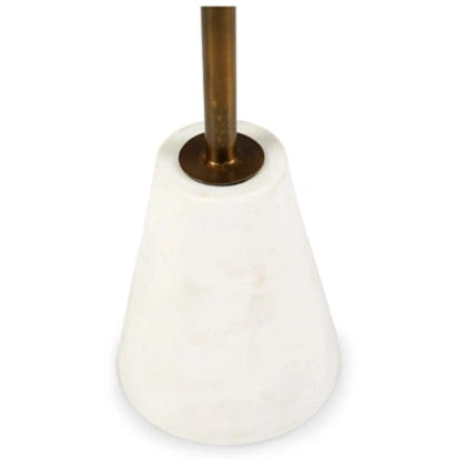 Perspective view of the Caramont drink table featuring a circular black marble top and a slim brass-finished pedestal neck with a conical white marble base