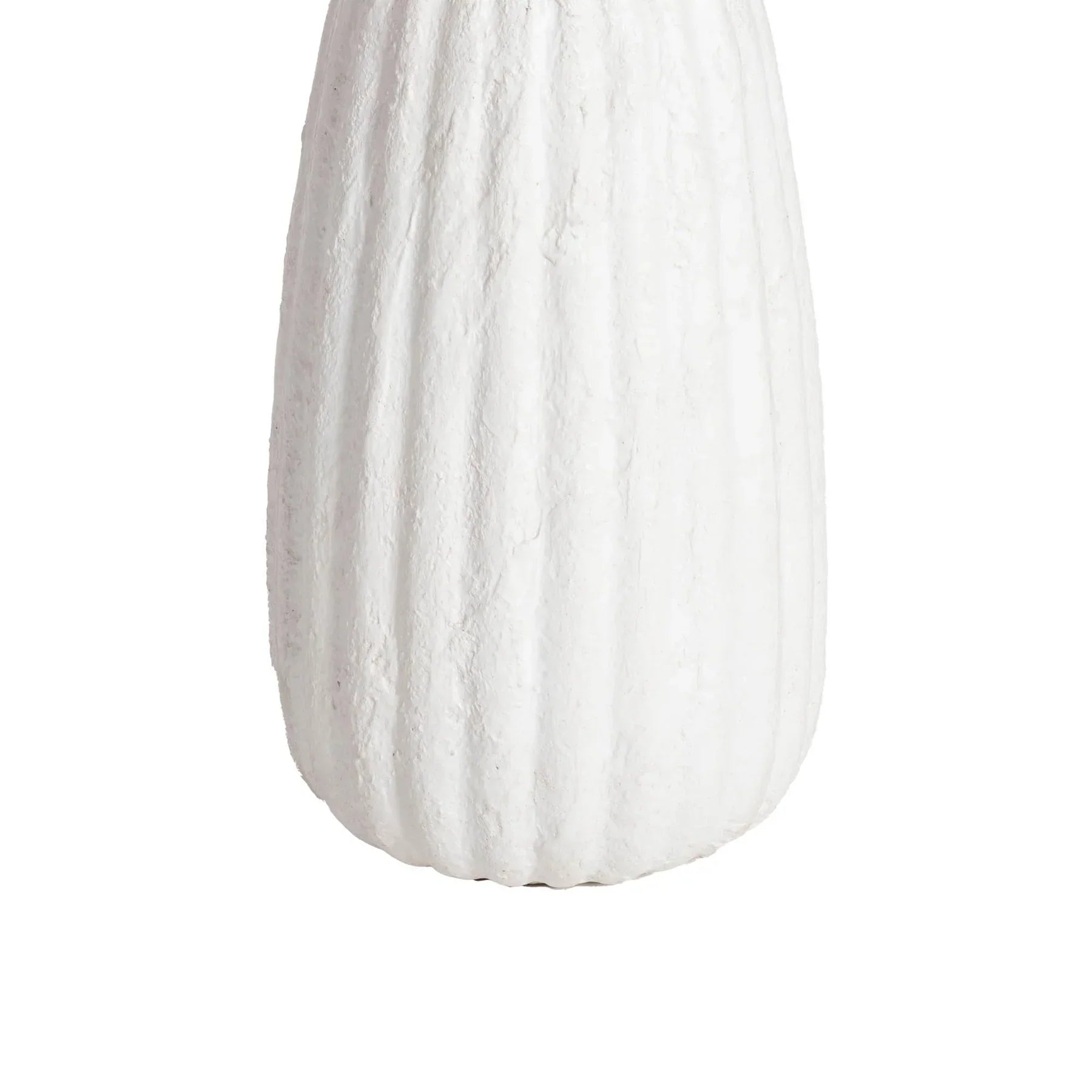 Front view of a white minimalist side table featuring a circular top and a unique fluted hourglass pedestal base with a textured plaster-like finish