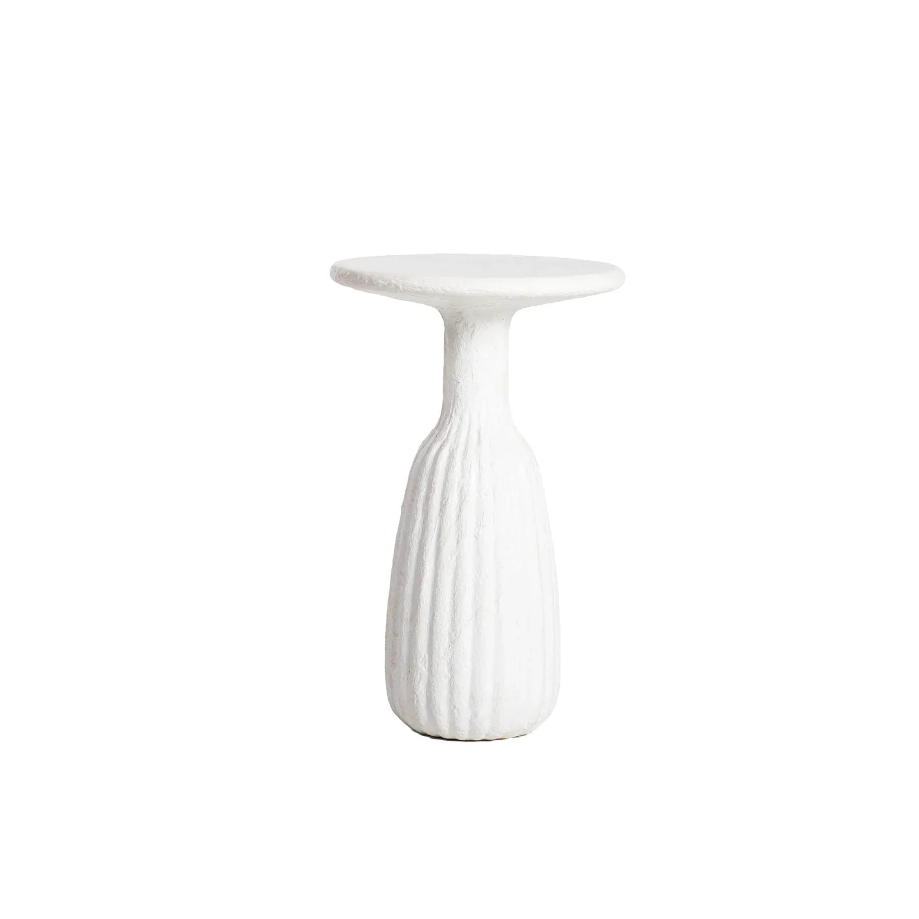 Front view of a white minimalist side table featuring a circular top and a unique fluted hourglass pedestal base with a textured plaster-like finish
