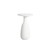 Front view of a white minimalist side table featuring a circular top and a unique fluted hourglass pedestal base with a textured plaster-like finish