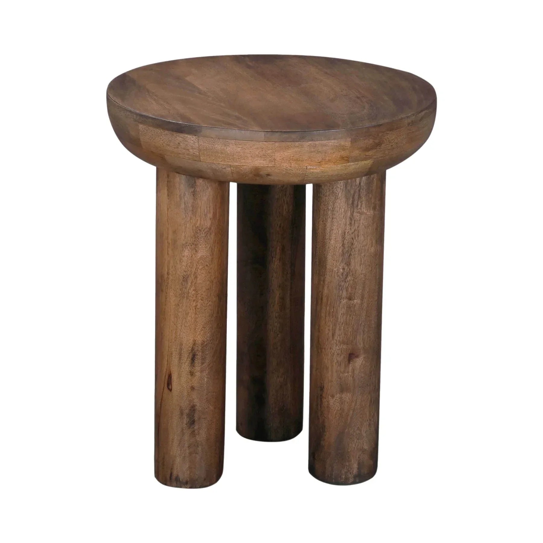 Lifestyle view of the Wilder table styled as a minimalist nightstand in a bright bedroom setting next to a white bed